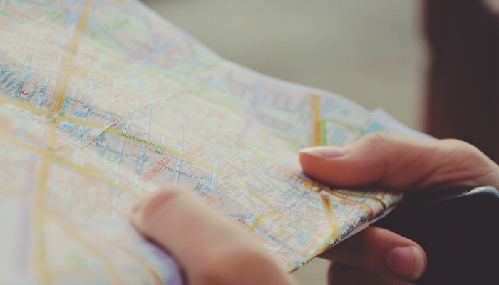 Holding a paper map